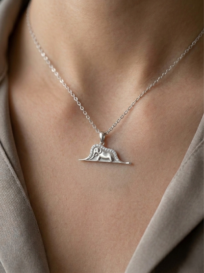 The Elephant in the Hat Necklace